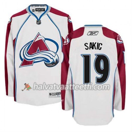 Reebok Miesten NHL Colorado Avalanche Pelipaita Joe Sakic #19 Vieras Valkoinen Reebok Miesten NHL Colorado Avalanche Pelipaita Joe Sakic #19 Vieras Valkoinen