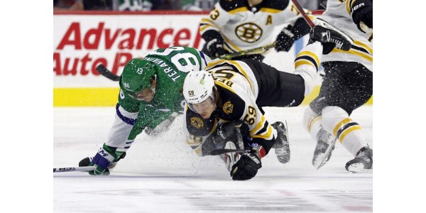 Boston Bruins defeated the Carolina Hurricanes 4-3, Pastrnak scores Nos. 50, 51